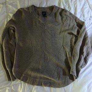 Medium tan sweater.